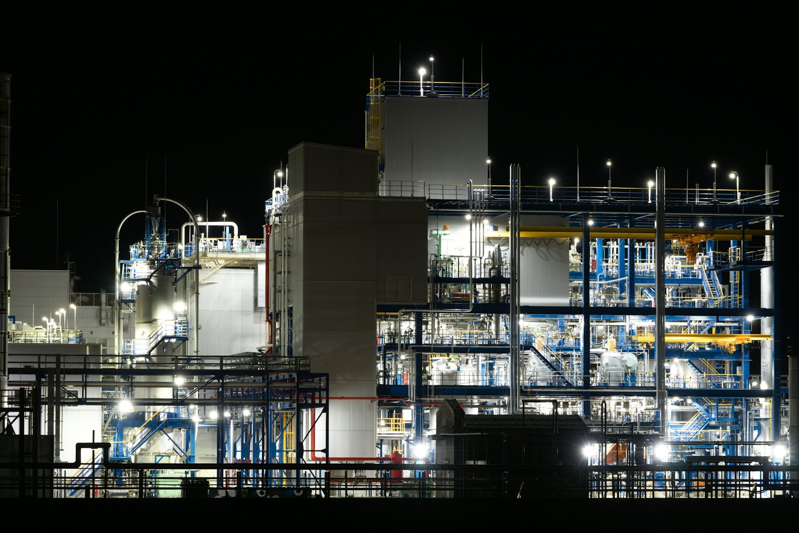 Petrochemical processing facility illuminated at night